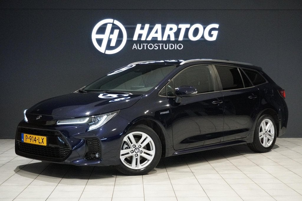 Toyota Corolla 1.8 Hybrid Style + DODEHOEK / STUURVERWARMING, 4 cilinders, Blauw, Corolla, Origineel Nederlands