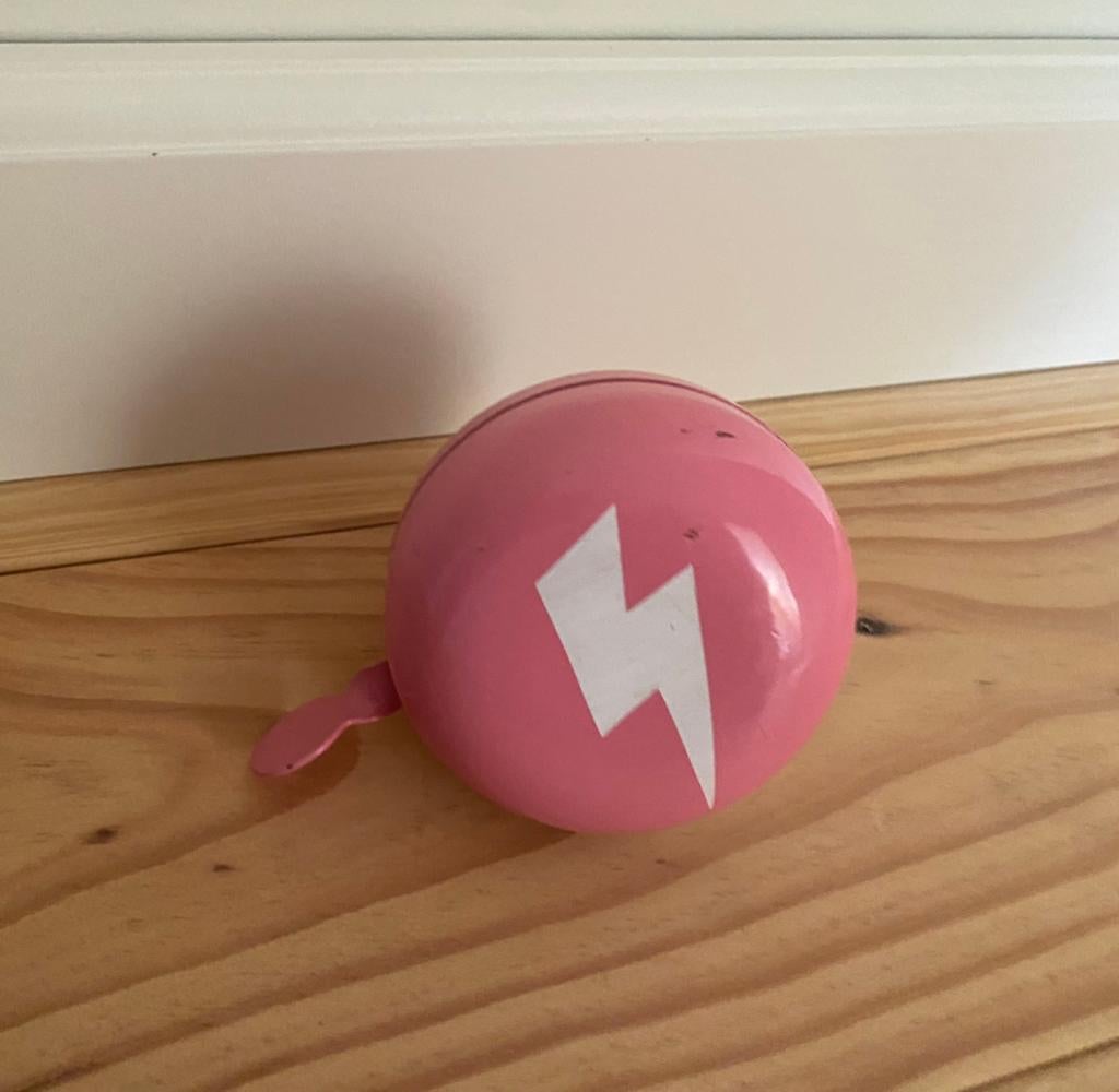 Grote roze fietsbel met bliksemflits, Ophalen of Verzenden
