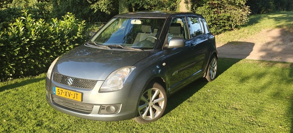 Suzuki Swift 1.3 Shogun (Ketting) 5DRS-2007, Voorwielaandrijving, Stof, 40 €/maand, Zwart