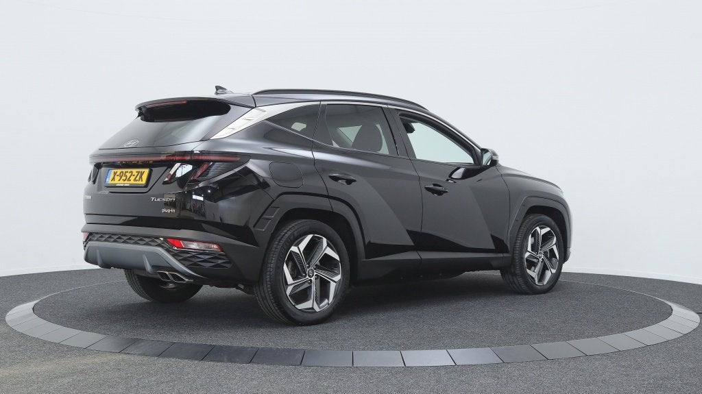 Hyundai Tucson 1.6 T-GDI PHEV Comfort Smart | Private lease, Auto's, Gebruikt, 4 cilinders, Zwart, Bedrijf