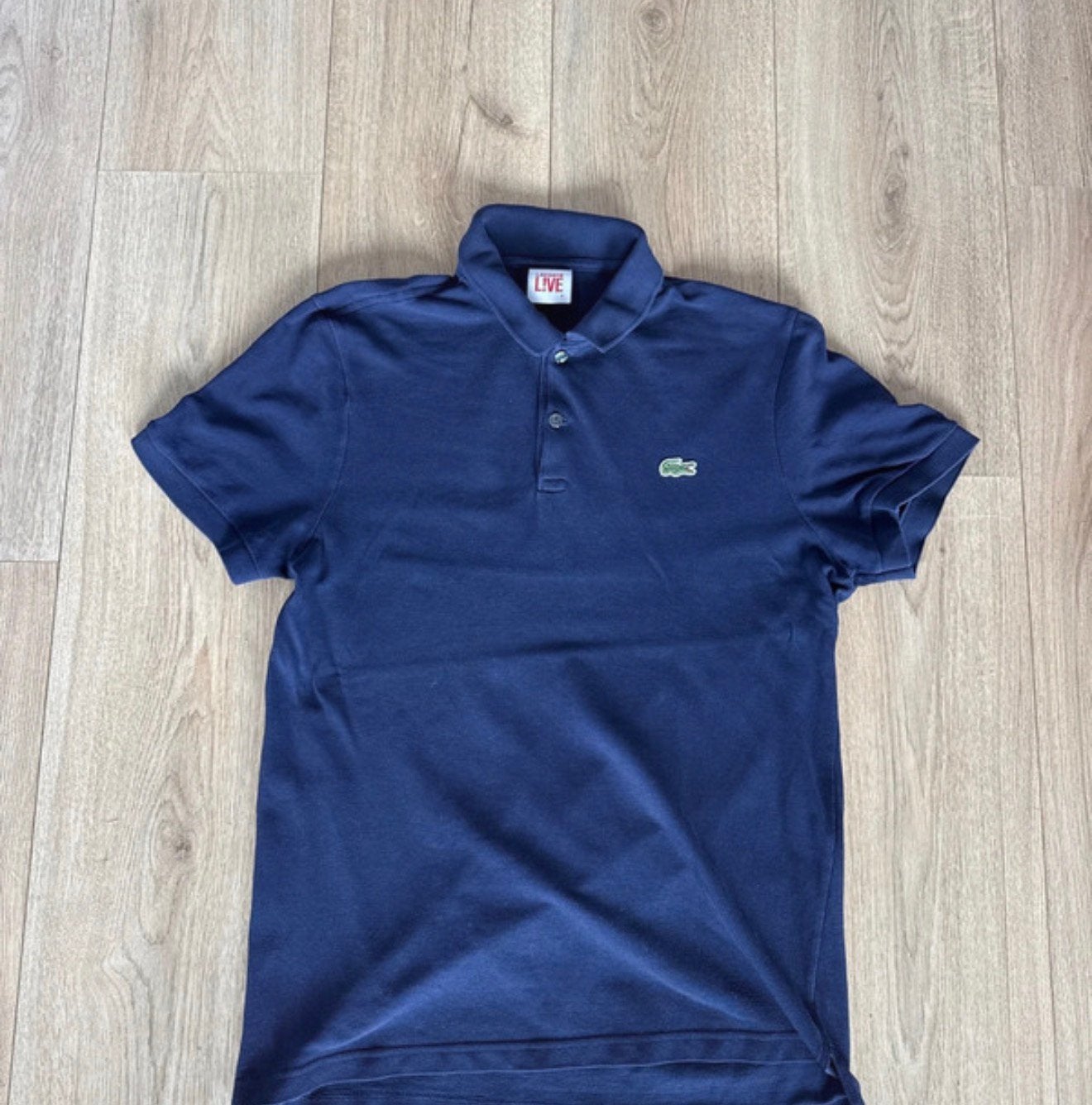 Donkerblauwe Lacoste polo, Ophalen of Verzenden, Zo goed als nieuw, Maat 48/50 (M), Blauw