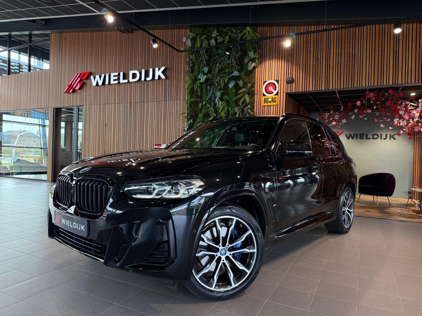 BMW X3 xDrive30e Business Edition Plus pano schuif trekhaak, Auto's, 4 cilinders, 2000 kg, Zwart, Bedrijf