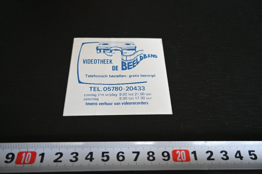sticker Videotheek DE BEELDBAND 05780-20433, Ophalen, Zo goed als nieuw