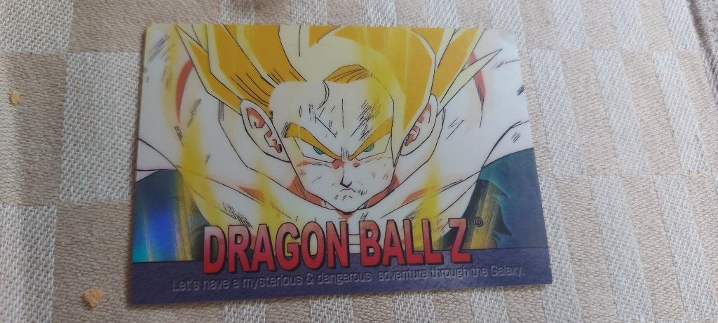 dragonball z kaart reverseholo Goku Super Saiyan angry, Ophalen of Verzenden, Zo goed als nieuw, Losse kaart