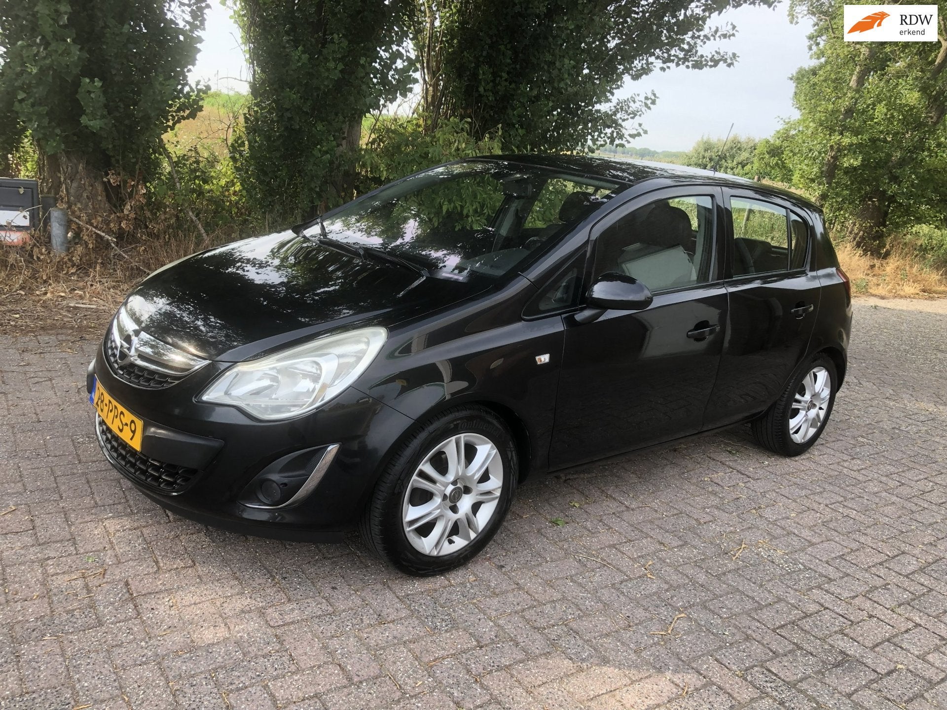 Opel Corsa 1.4-16V Cosmo automaat|Eerste eigenaar, Auto's, 101 pk, Gebruikt, 4 cilinders, Parkeersensor