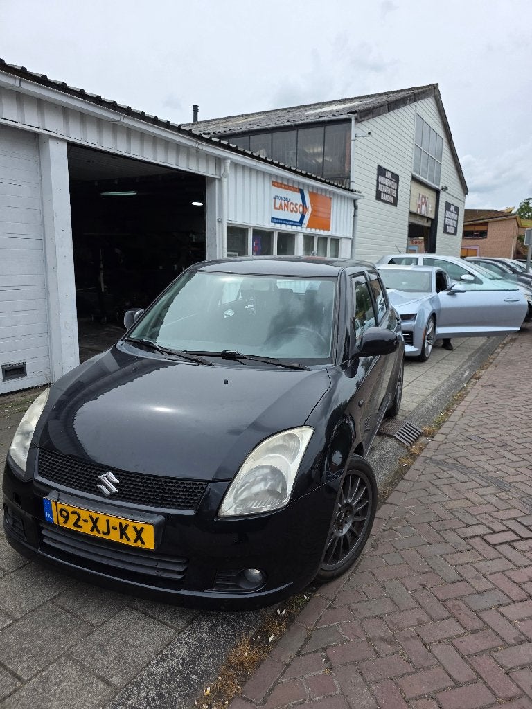 Suzuki Swift 1.3 - 5 deurs - 2007, Voorwielaandrijving, Stof, 40 €/maand, Zwart