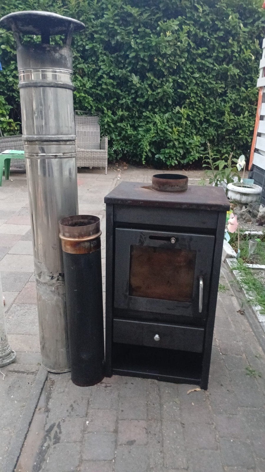 Houtkachel met dubbelwandige pijp, Ophalen