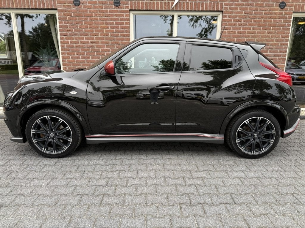 Nissan Juke 1.6 Turbo NISMO All CAMERA/ N.A.P / RIJKLAAR, Auto's, Nissan, Euro 5, 1618 cc, Gebruikt, Zwart