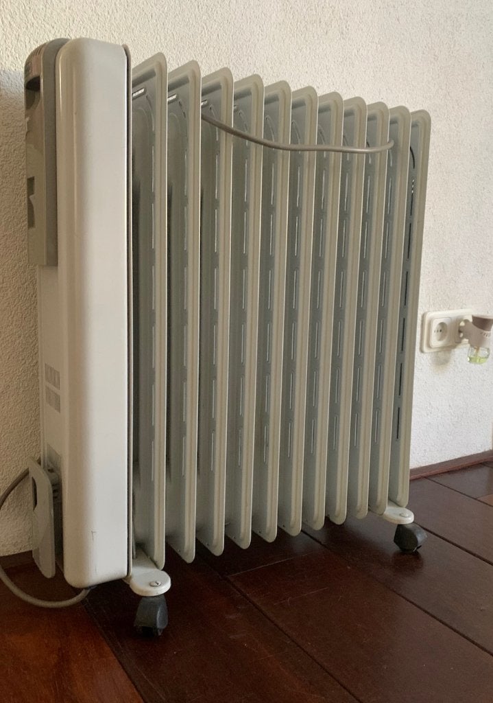 DeLonghi Oliegevulde Radiator 2000 Watt. Werkt prima., Doe-het-zelf en Verbouw, Ophalen, 30 tot 80 cm, Gebruikt, Radiator