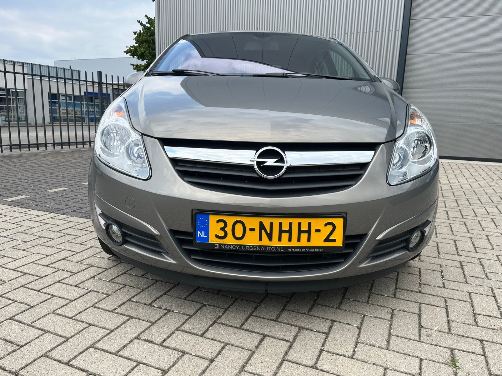 Opel Corsa 1.2 16V 5D Easytronic 2010 Bruin, Auto's, Opel, Particulier, Corsa, ABS, Airbags, Airconditioning, Alarm, Automatische klimaatregeling