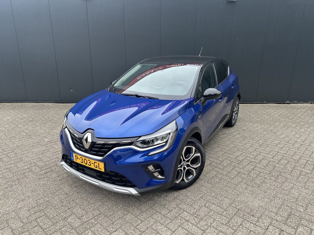 Renault Captur 1.6 E-Tech Hybrid 145 Intens | Achteruitrijca, Auto's, Renault, 12 maanden, Gebruikt, Blauw, Leder en Stof