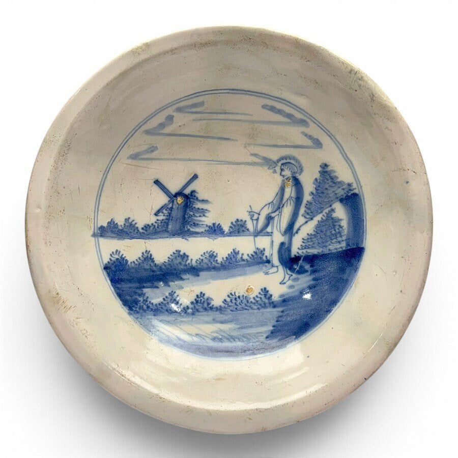 Majolica wandbord: heilig figuur met molen, 17e/18e eeuws