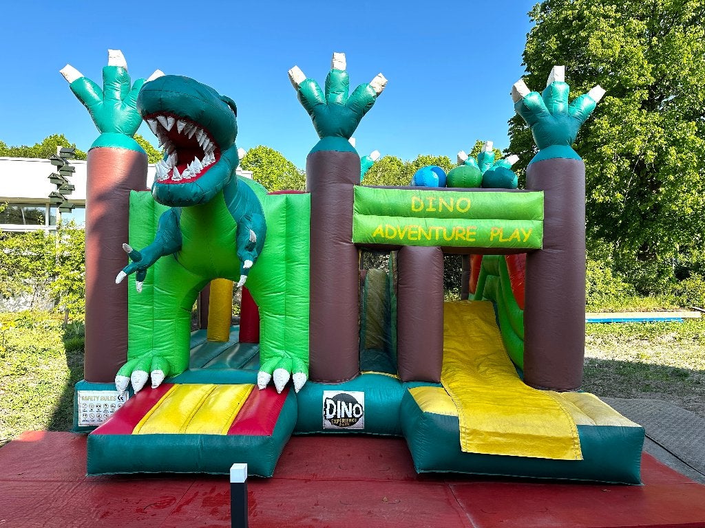 Dino springkussen met glijbaan en blower, Ophalen, Gebruikt