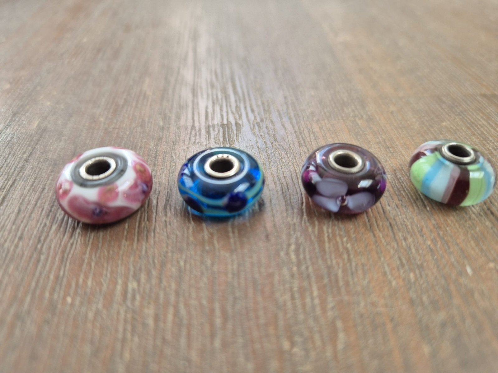 4 Trollbeads glaskralen - diverse kleuren, Sieraden, Tassen en Uiterlijk, Bedels, Glas of Kristal, Ophalen of Verzenden, Zo goed als nieuw
