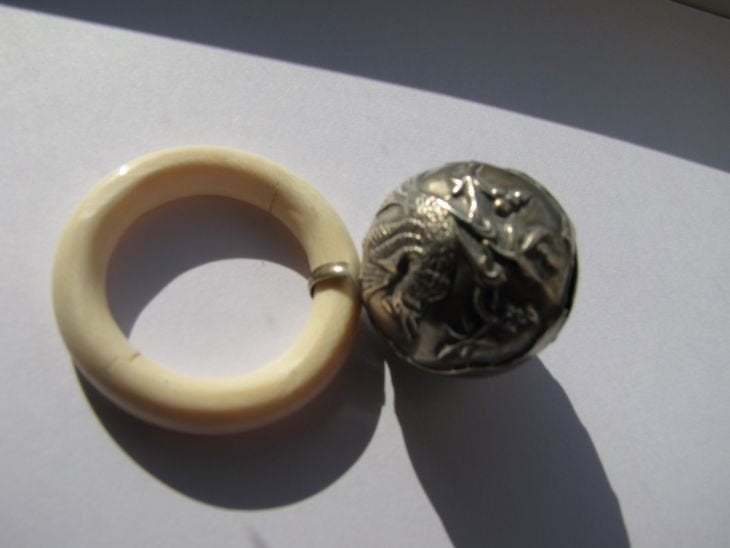 Zilveren rammelaar, Verzenden, Zilver