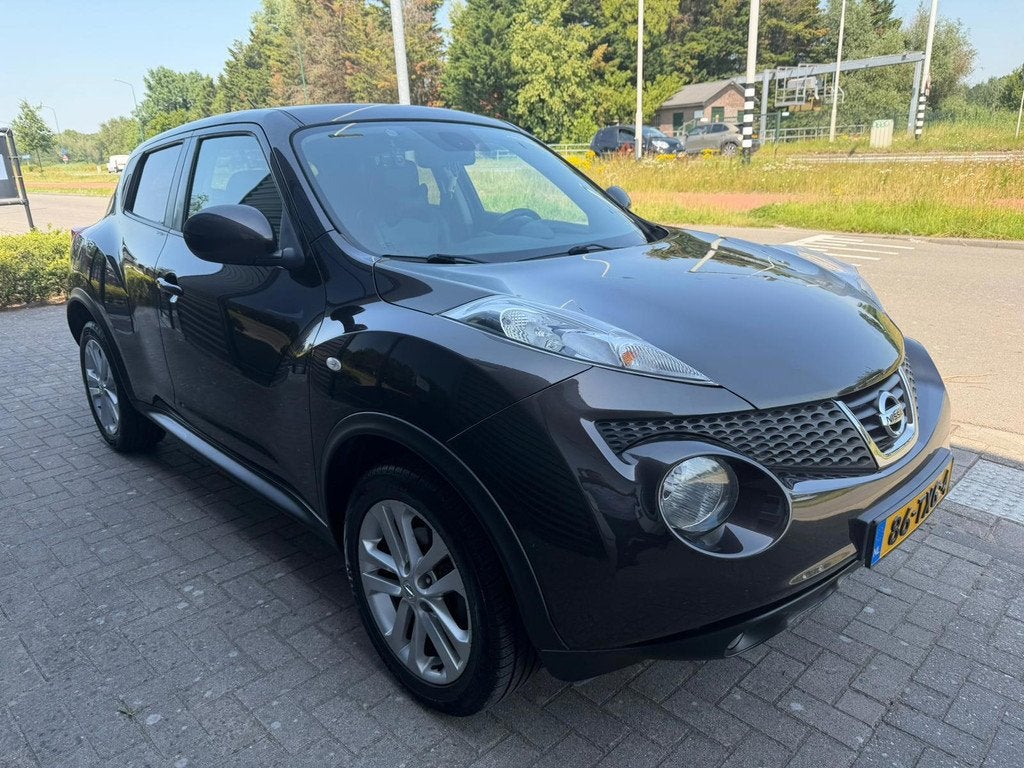 Nissan Juke 1.6 Tekna, Auto's, Nissan, Euro 5, 4 cilinders, Bruin, SUV of Terreinwagen
