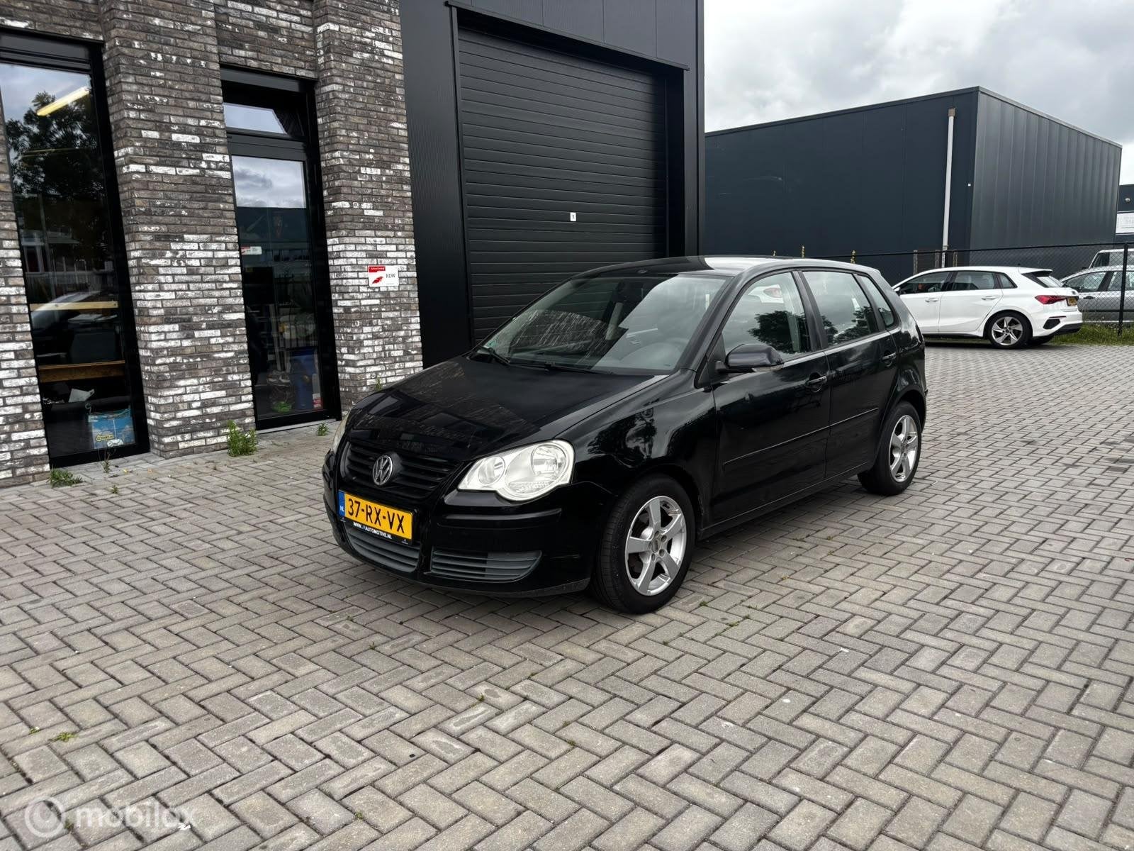 Volkswagen Polo 1.4-16V Sportline, Auto's, Volkswagen, Voorwielaandrijving, Startonderbreker, Zwart, Origineel Nederlands