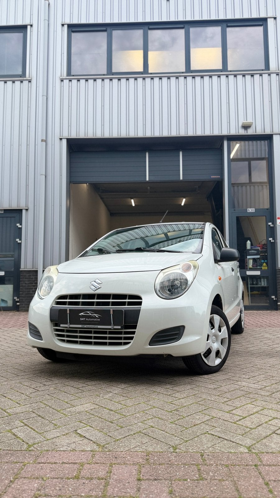 Suzuki Alto1.2 5-D 2012 Wit, Auto's, Suzuki, Voorwielaandrijving, Euro 5, Stof, 400 kg