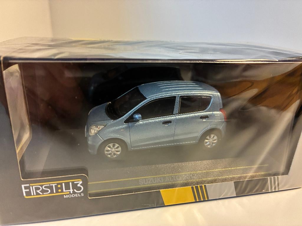 27537: Suzuki Alto - 2012 - First43 1:43, Hobby en Vrije tijd, Auto, Nieuw, Ophalen of Verzenden, Bachsatztstr. 54 D 72131 Ofterdingen, Germany