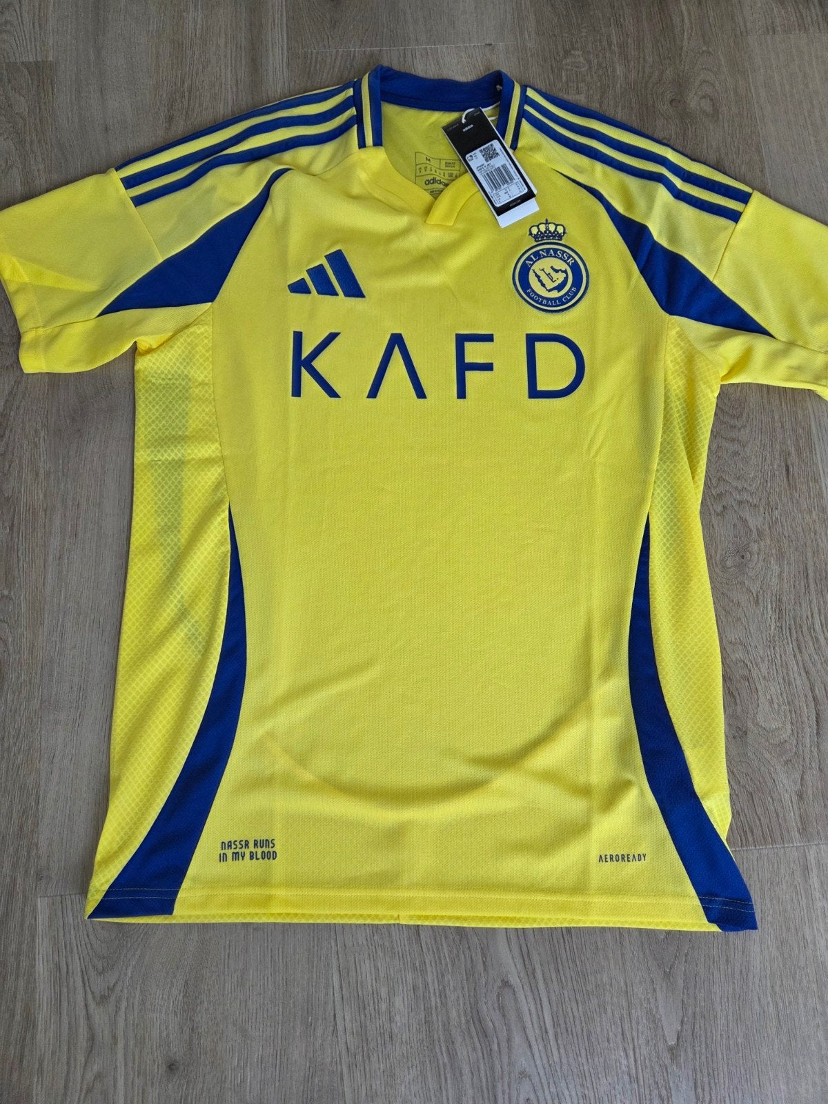 Al Nassr shirt maat M  - origineel en nieuw!, Maat L, Ophalen of Verzenden, Nieuw, Shirt