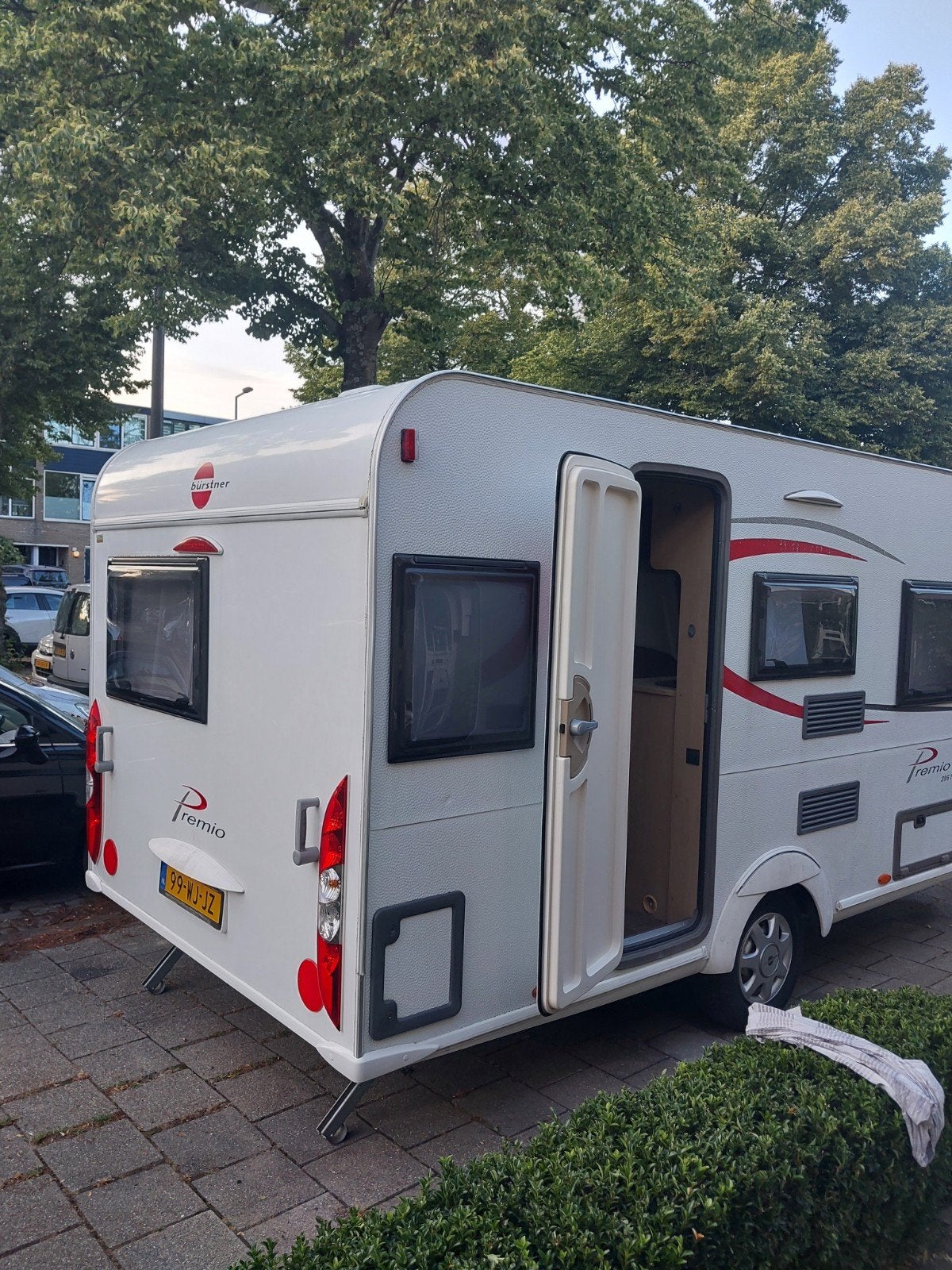 Burstner Premio 395ts - Compacte en complete caravan (2012), Caravans en Kamperen, Caravans, Particulier, tot en met 4, Treinzit