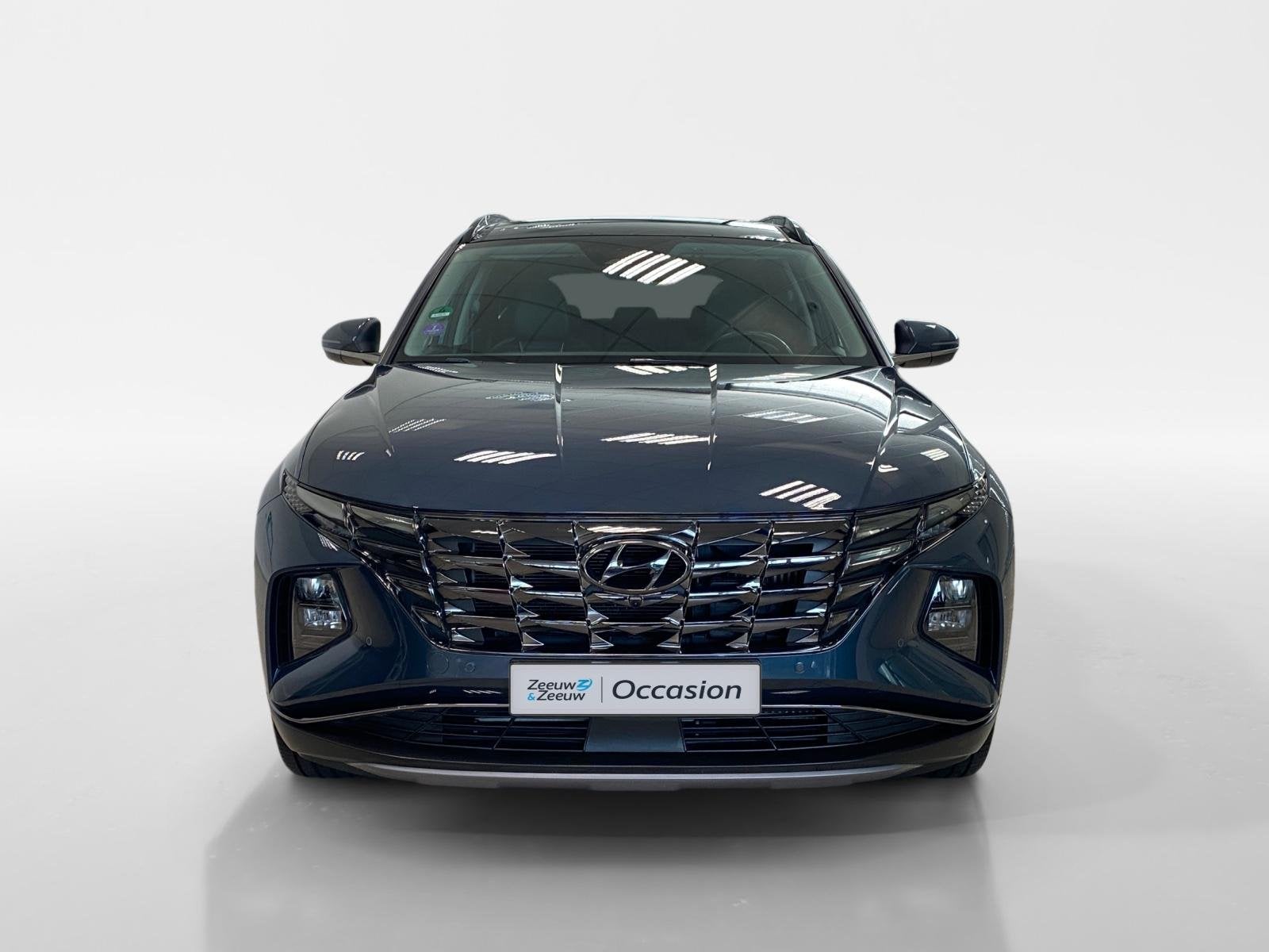 Hyundai Tucson 1.6 HYBRID | PREMIUM SKY | LEDER | 1650KG TRE, Auto's, 12 maanden, Gebruikt, Euro 6, 4 cilinders