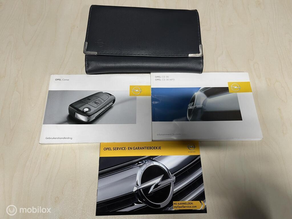 Instructieboekje Opel Corsa D  ('06-'15), Auto-onderdelen, Overige Auto-onderdelen, Opel, Gebruikt, Ophalen of Verzenden