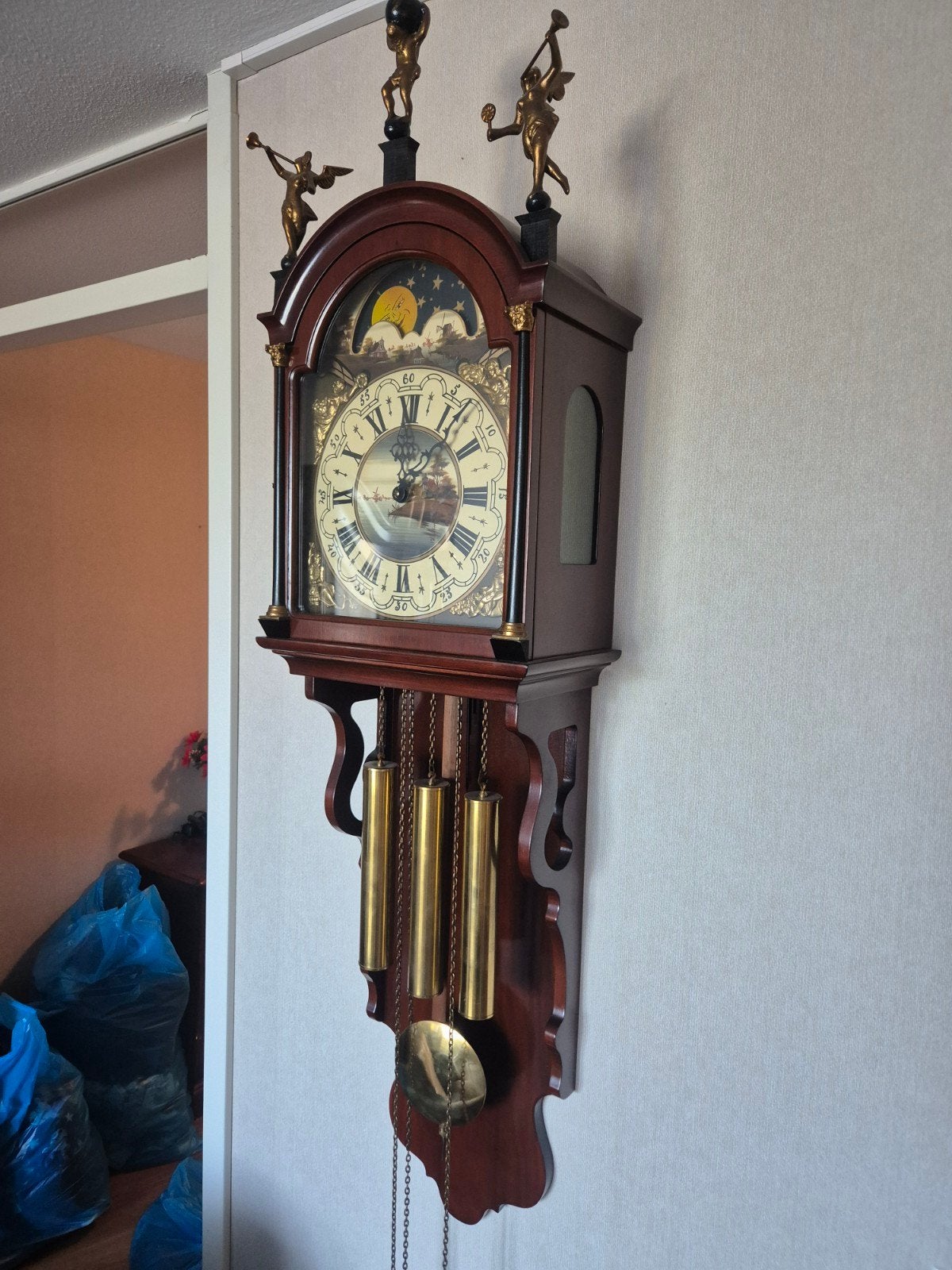 wandklok met maanfase en gewichten, Ophalen, Wandklok