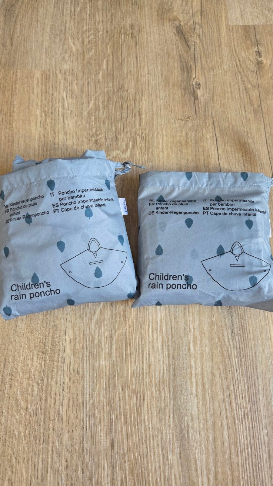 regenponcho 2x blauw 110/128, Caravans en Kamperen, Regenkleding, Ophalen of Verzenden, Nieuw, Regenponcho, Kinderen
