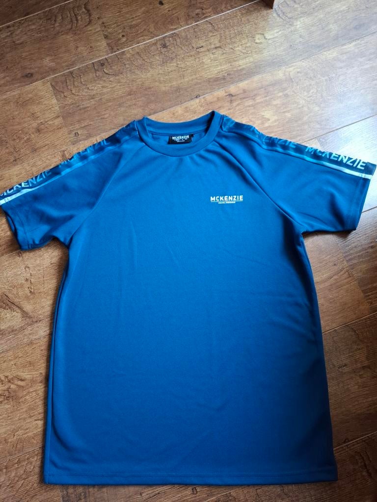 McKenzie Sportshirt Blauw Maat M - Zo goed als nieuw, Kleding | Heren, Sportkleding, Ophalen, Blauw, Zo goed als nieuw, McKenzie