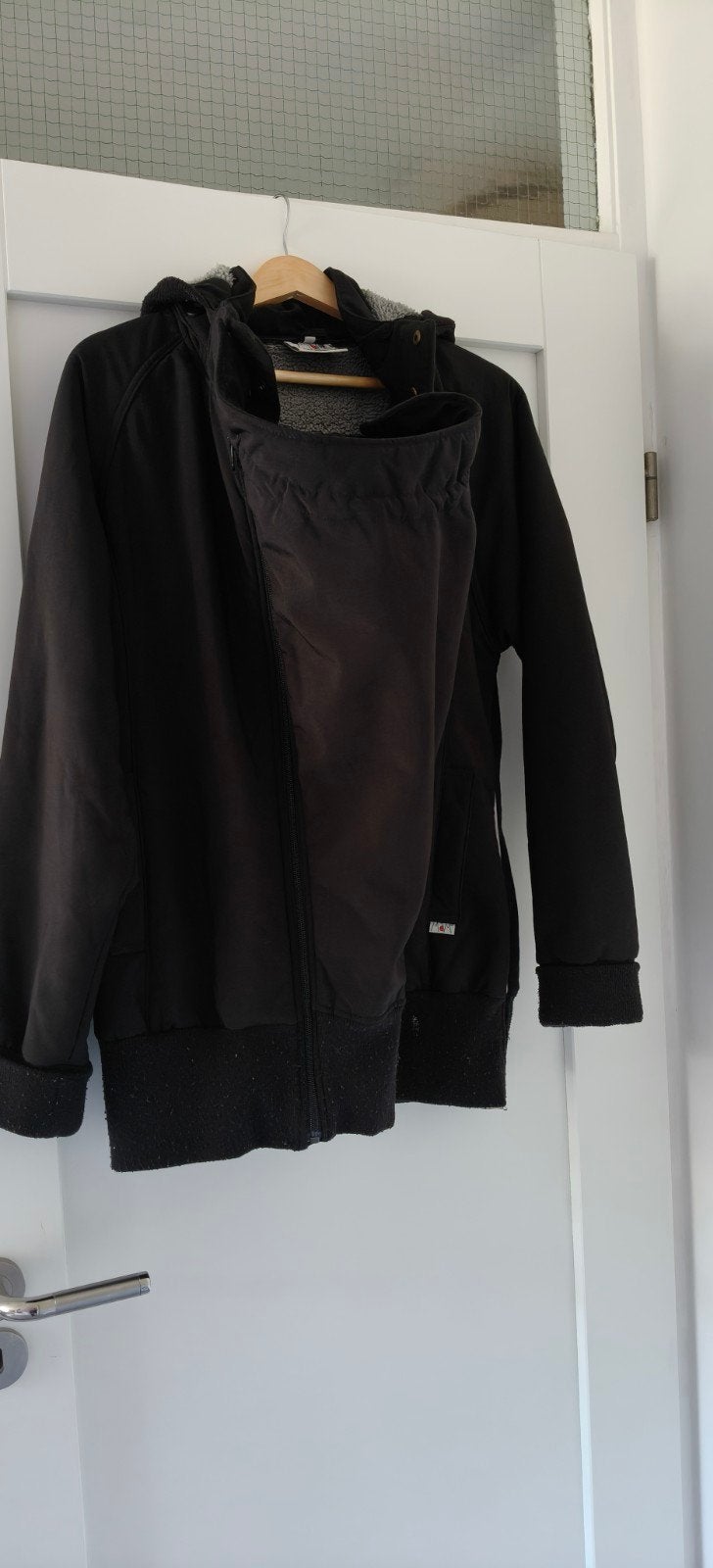 Zwarte draagjas winter buik en rug dragen maat L, Ophalen of Verzenden, Gedragen, Maat 42/44 (L), Zwart