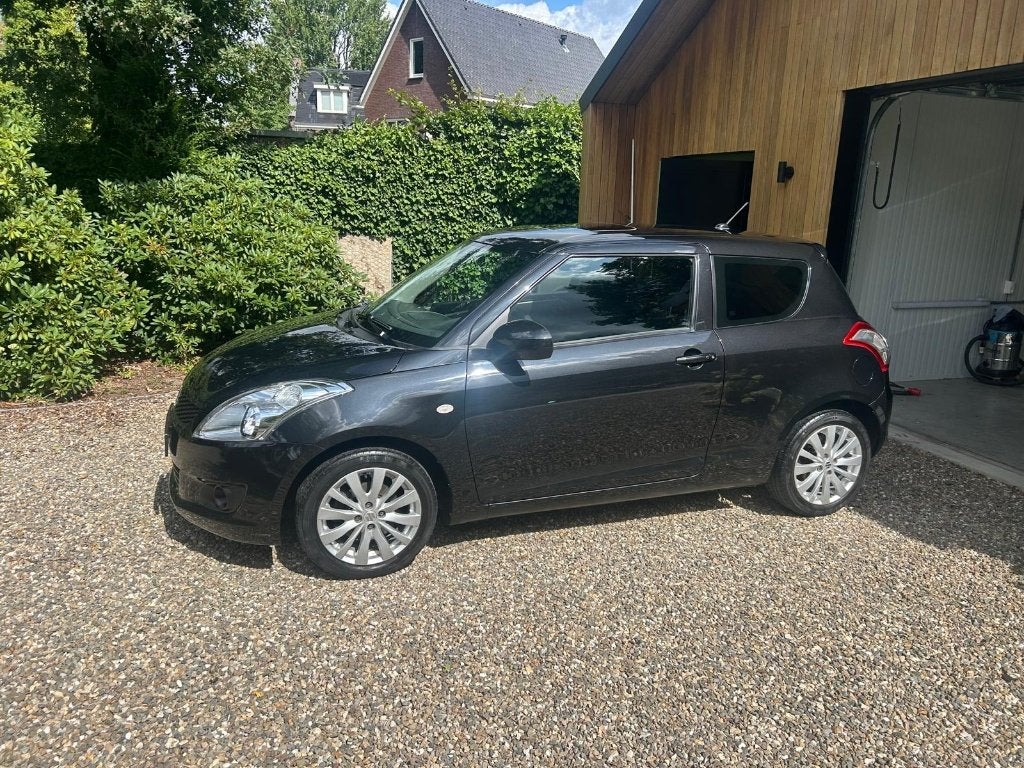 Suzuki Swift Exclusive, Voorwielaandrijving, Euro 5, Stof, Handgeschakeld