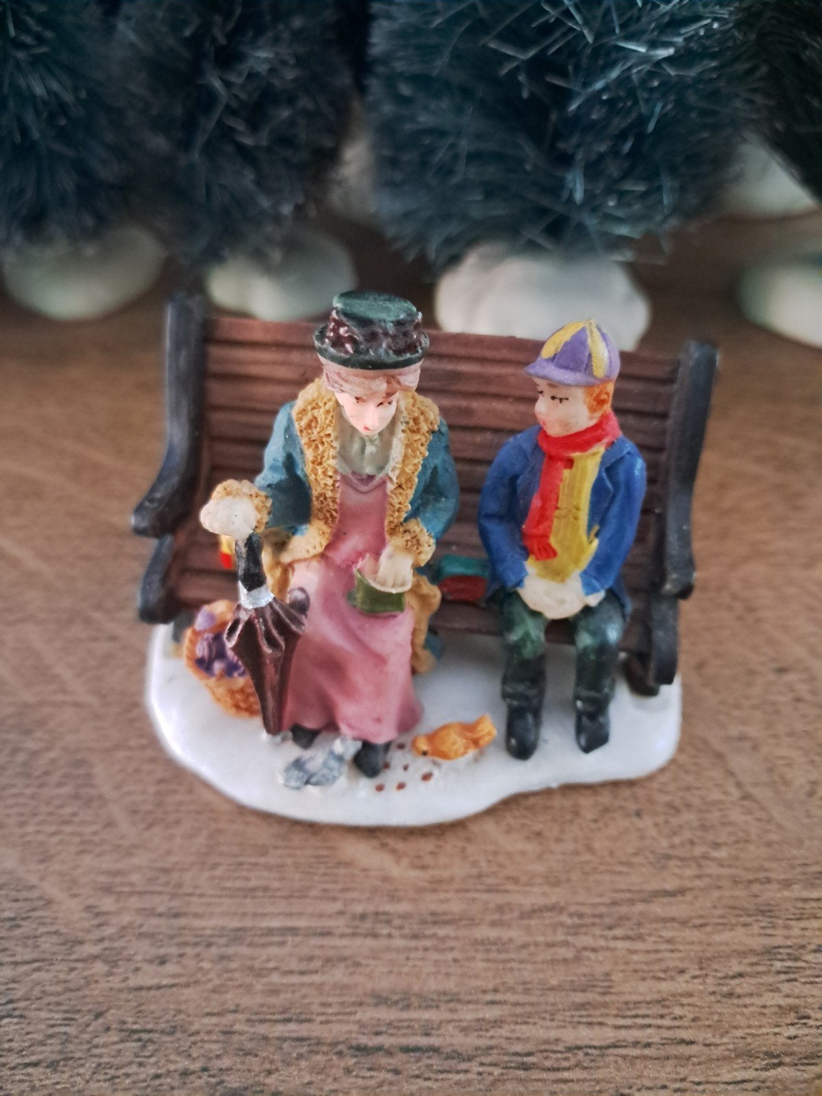 lemax oma met jongen vogels voeren, Ophalen