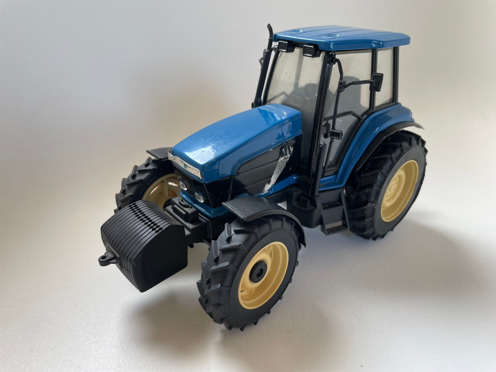 Model New Holland 8770 tractor trekker, blauw, ROS, 1/32 (?), Ophalen of Verzenden, Gebruikt, Tractor of Landbouw, ERTL