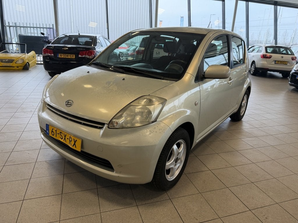 Daihatsu Sirion 2 1.0-12V Trend (bj 2006), Auto's, Daihatsu, Voorwielaandrijving, Stof, Gebruikt, Beige