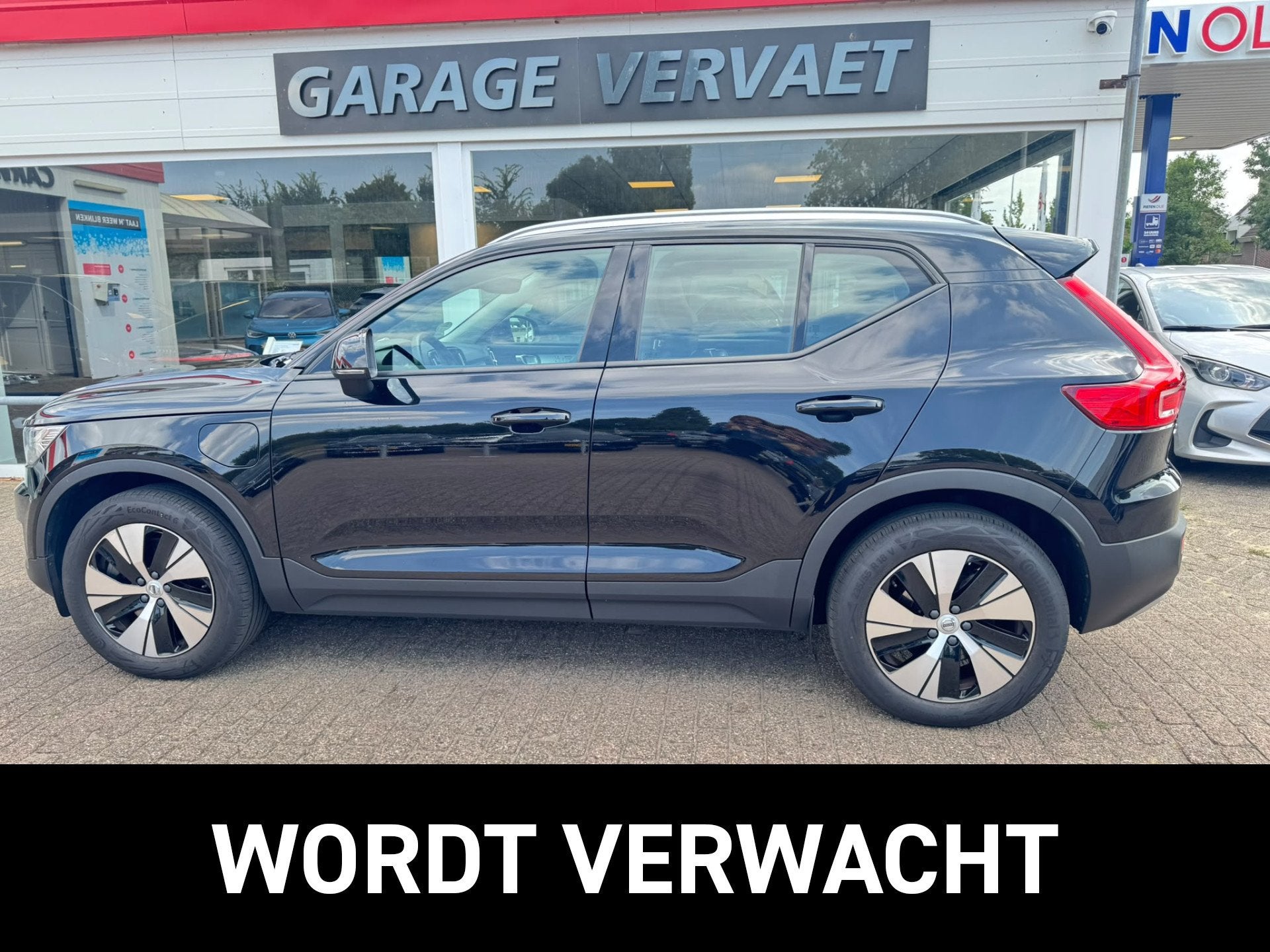 Volvo XC40 1.5 T5 Twin Engine Momentum Pro (bj 2020), Auto's, Gebruikt, Leder en Stof, Zwart, Hybride Elektrisch/Benzine