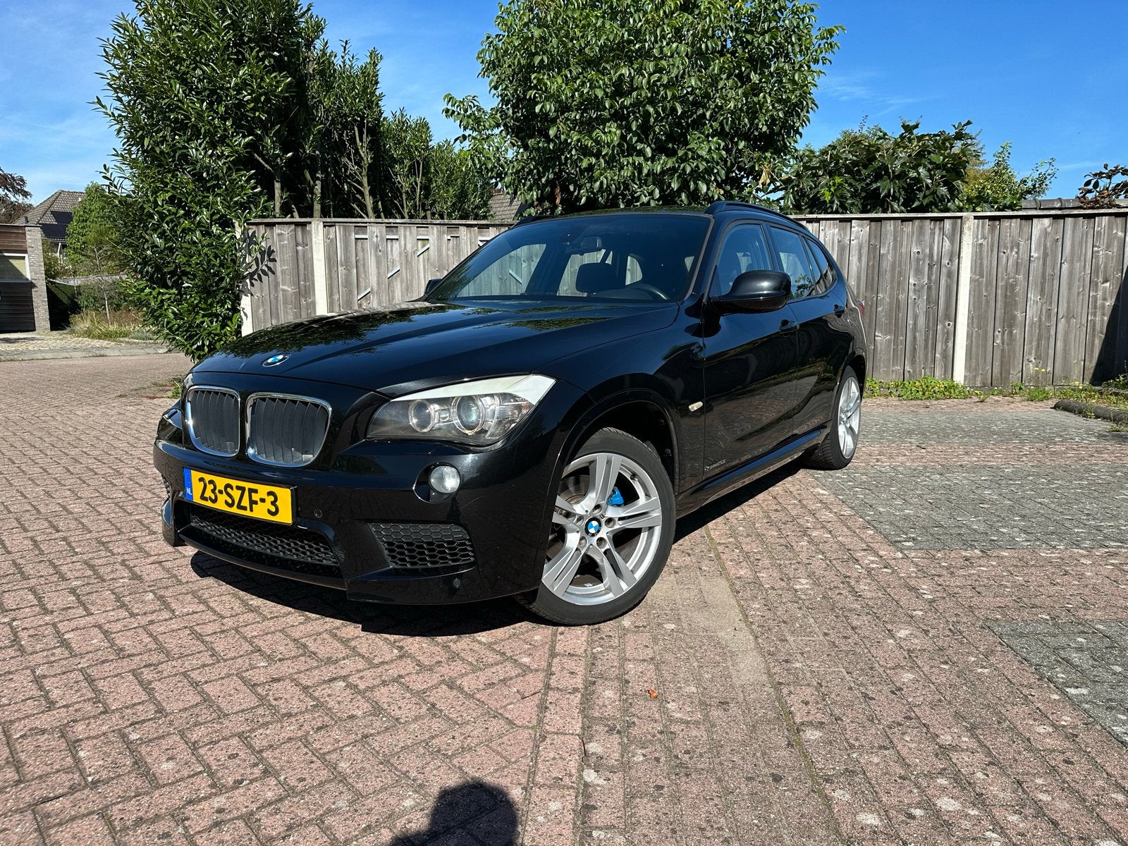 BMW X1 2.0 Sdrive 20I AUT 2011 Zwart, Auto's, Achterwielaandrijving, 1800 kg, 4 cilinders, Zwart