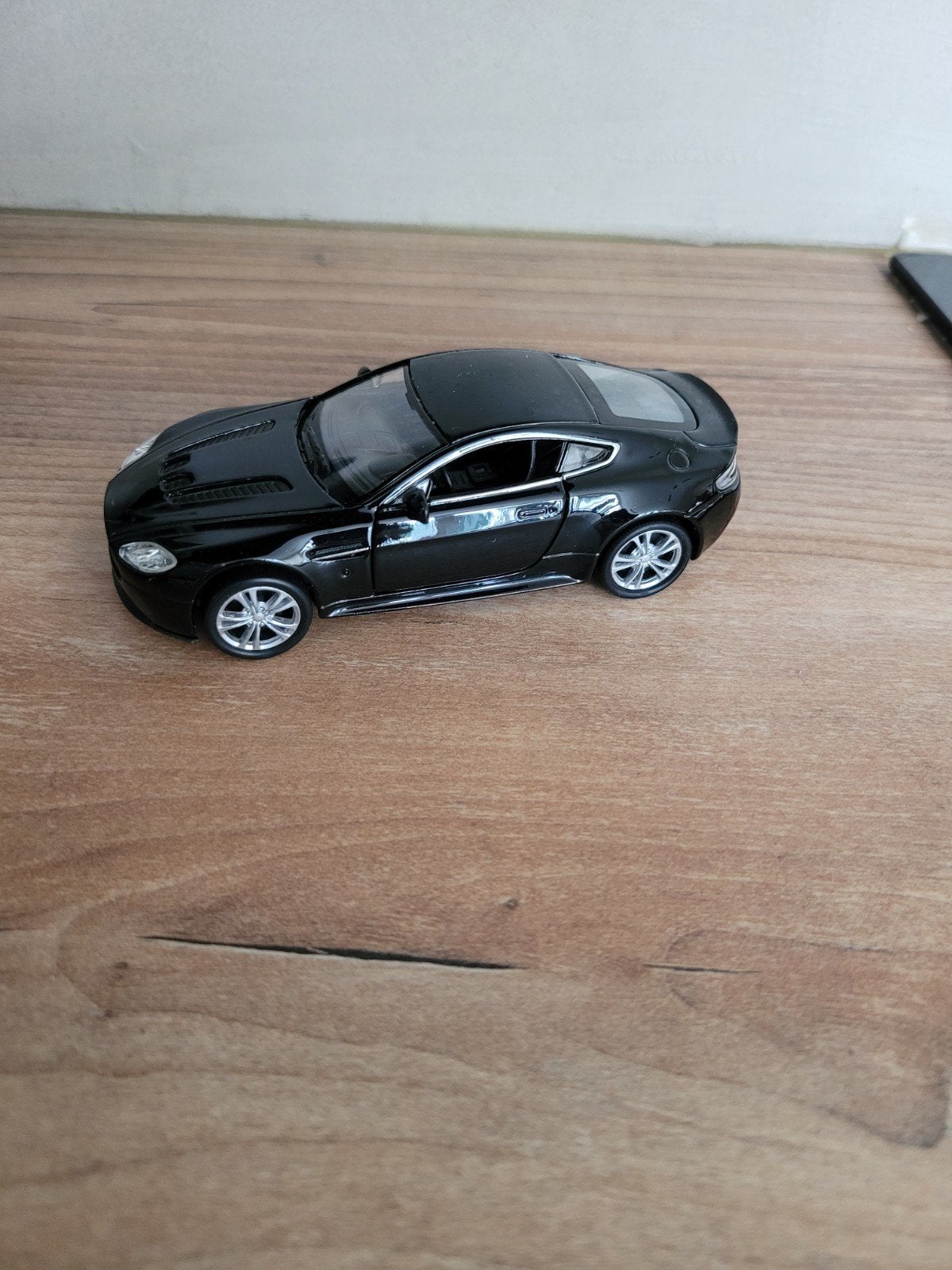 Nette zwarte Welly Aston Martin Vantige Noir, Ophalen of Verzenden, Zo goed als nieuw, Auto, Welly