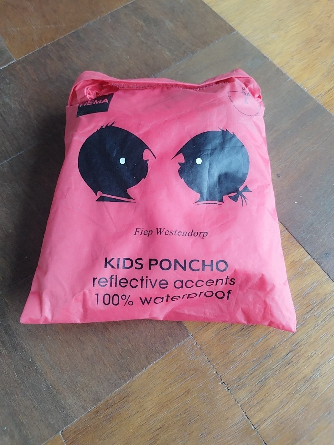 Kids poncho, Ophalen, Regenjas