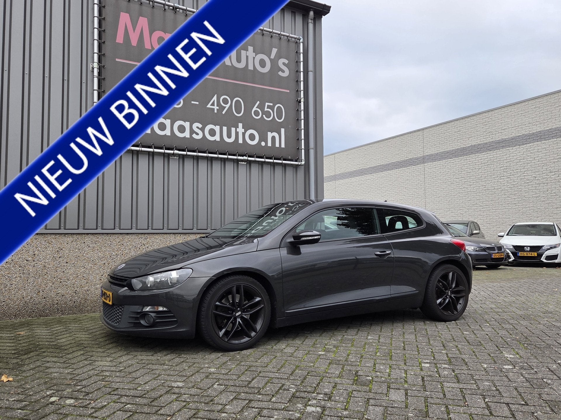 Volkswagen Scirocco 2.0 TSI automaat sport uitvoering 200 pk, Dealer onderhouden, Gebruikt, Zwart, 4 cilinders
