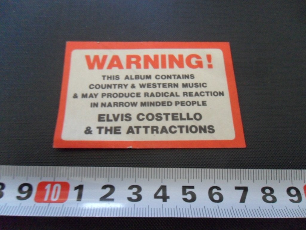 sticker WARNING !  Elvis Costello & The Attractions, Ophalen, Zo goed als nieuw