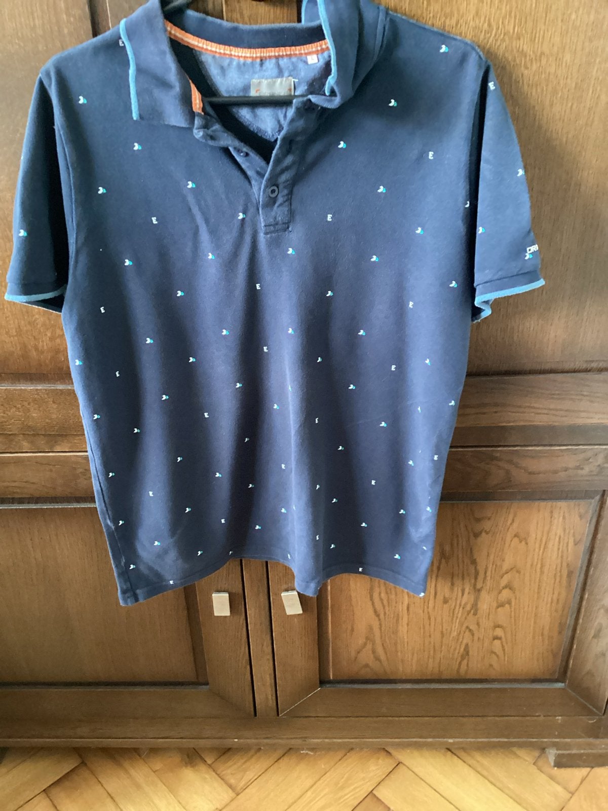 Leuke Orange polo met klein motiefje - Maat L, Ophalen of Verzenden, Gedragen, Maat 52/54 (L), Blauw
