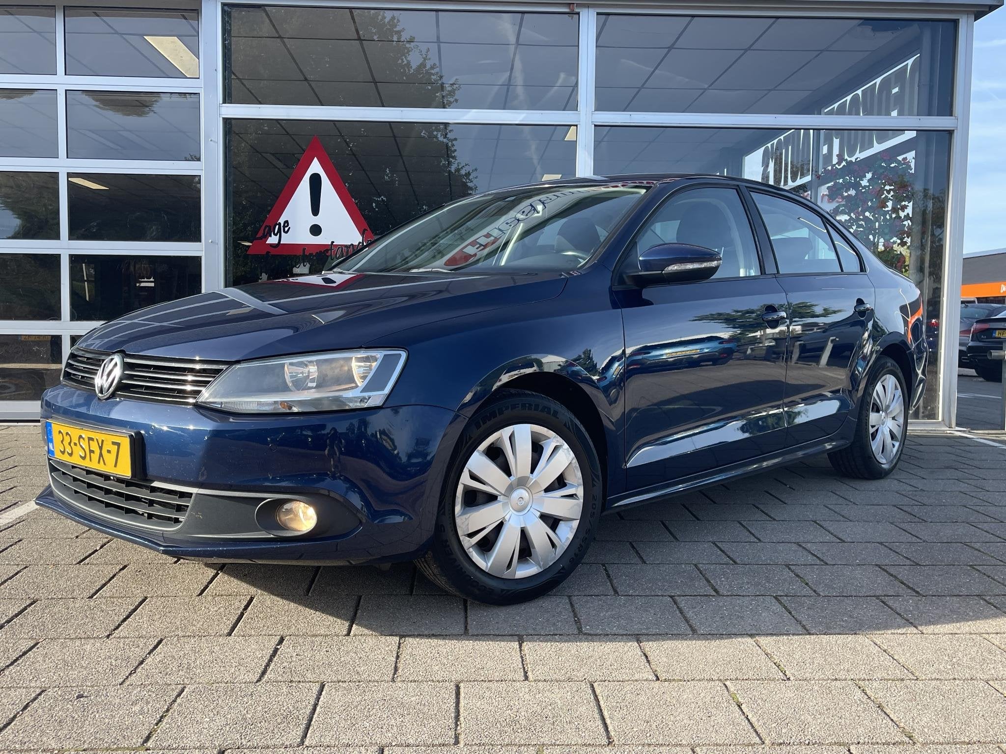 Volkswagen Jetta 1.2 TSI Comfortline /Cruise/Clima/, Auto's, Voorwielaandrijving, Euro 5, Stof, Gebruikt