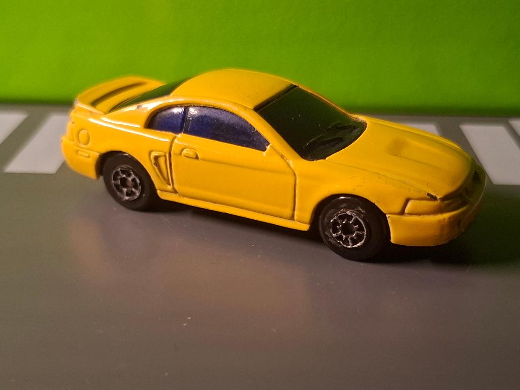Maisto - 1999 Ford Mustang [geel] 1/60, Ophalen of Verzenden, Gebruikt, Auto