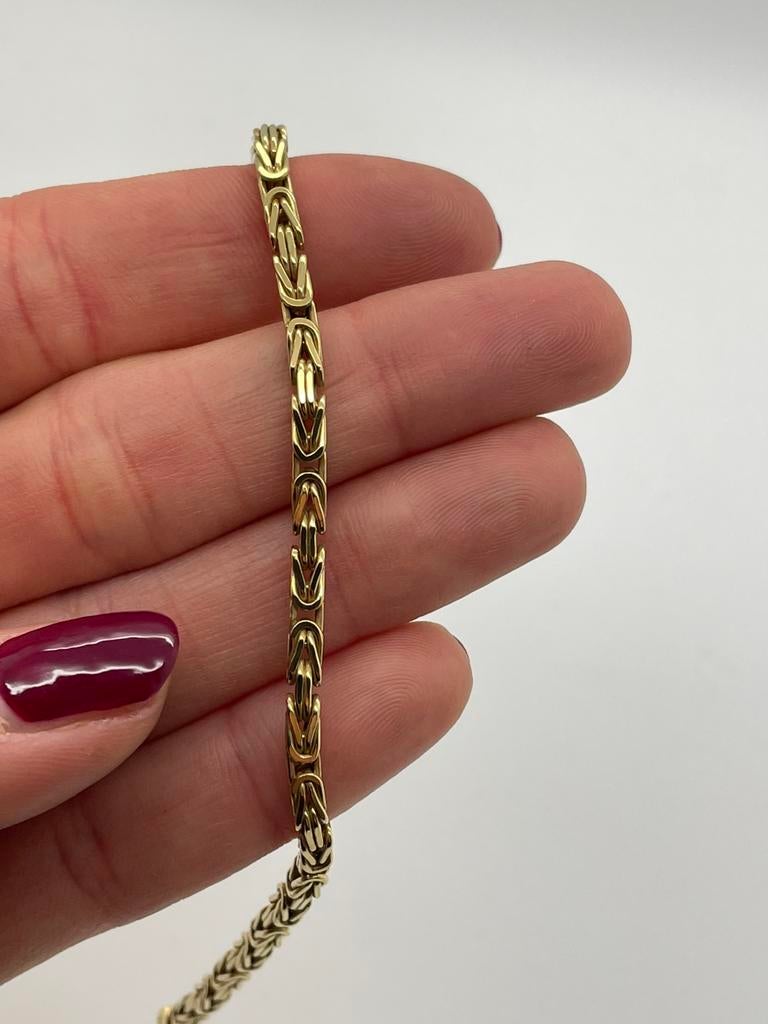 C456 Prachtige zilveren armband koningsschakel goudkleur, Ophalen of Verzenden, X, Goud, Zilver