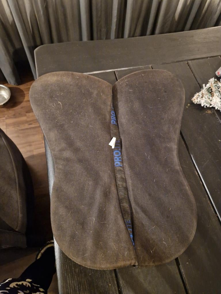 Zadel pad, Ophalen