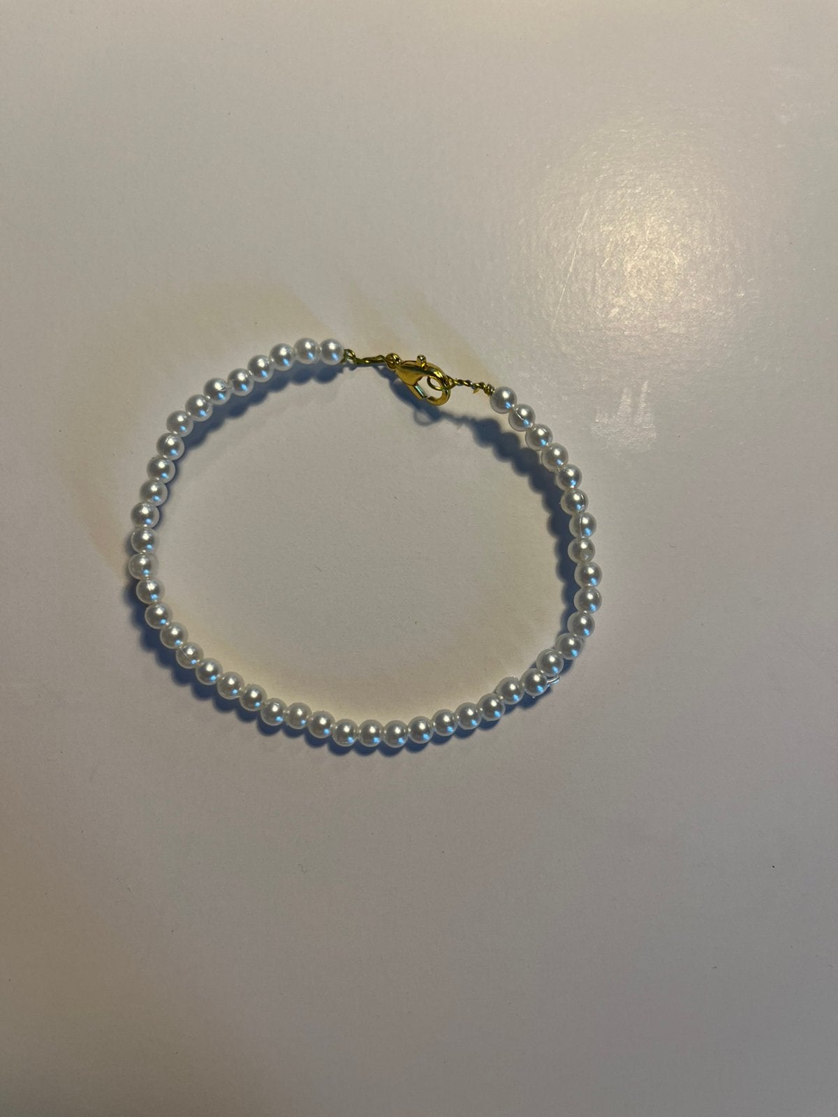 Parel armband, Ophalen of Verzenden, Zo goed als nieuw, Goud