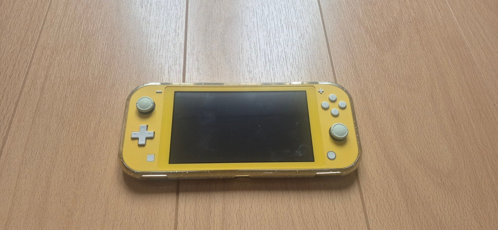 Nintendo Switch Lite Geel met Glitterhoes, Spelcomputers en Games, Ophalen, Geel, Zo goed als nieuw, Met beschermhoes of tas