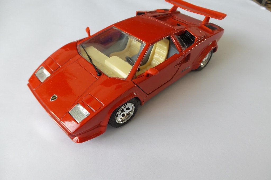 Lamborghini Countach Burago 1/24, Ophalen of Verzenden, Zo goed als nieuw, Auto, Bburago
