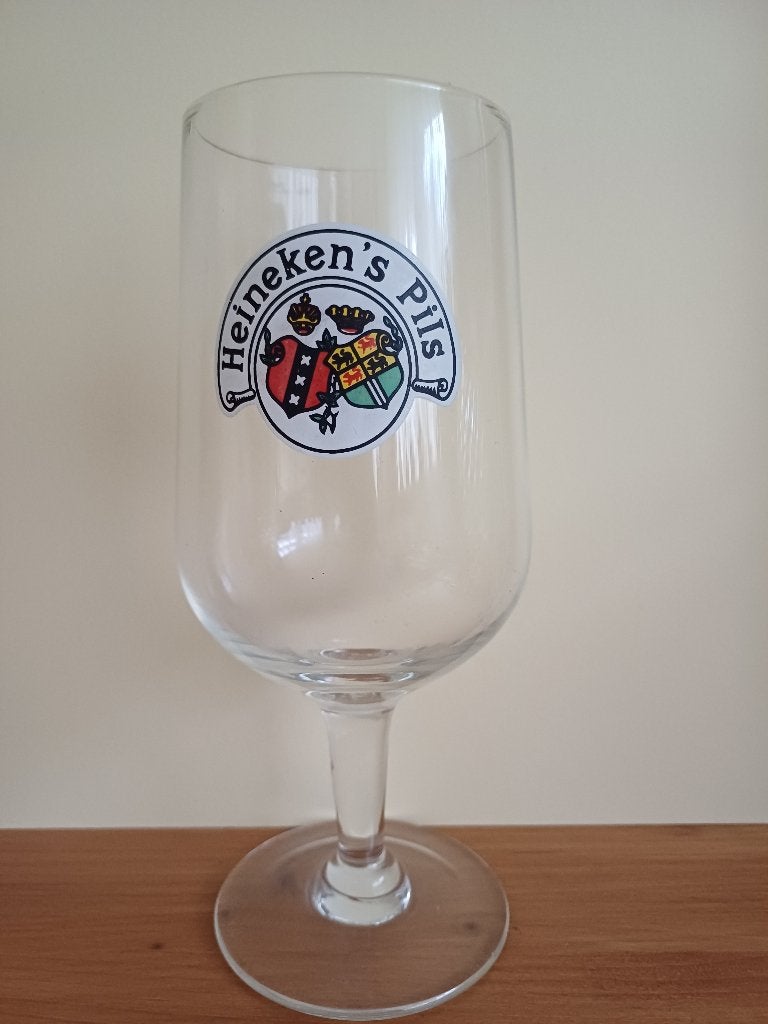 Heineken's  Pils voetglas hoogte 17,5 cm, Ophalen of Verzenden, Zo goed als nieuw, Glas of Glazen, Heineken